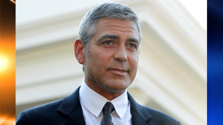 Actor George Clooney speaks to reporters after meeting with President Barack Obama about his recent trip to Sudan at the White House in Washington, Tuesday, Oct. 12, 2010. (AP Photo/Charles Dharapak)