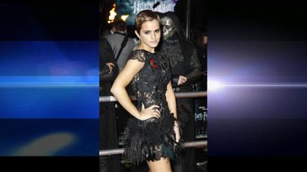 British actress Emma Watson arrives at a cinema in Londons Leicester Square for the World Premiere of Harry Potter and the Deathly Hallows Part 1, as masked actors stand behind, Thursday, Nov. 11, 2010.
Associated Press