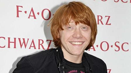In this photo provided by FAO Schwarz, Rupert Grint, who plays Ron Weasley in the Harry Potter films, arrives to open what FAO Schwarz says is the first Harry Potter Shop in the United States at an FAO Schwarz store, Friday, July 13, 2007, in New York. The latest Harry Potter movie by Warner Bros., Harry Potter and the Order of Phoenix, opened this week.