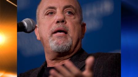 FILE -- In an Oct. 23, 2008 file photo Musician Billy Joel speaks at the National Press Club in, Washington. Liberty DeVitto has filed a lawsuit in Manhattans state Supreme Court demanding Joel pay him overdue royalties. The 58-year-old says he was Joels drummer from 1975 to 2005 and helped the piano man craft some of his biggest albums. (AP Photo/Evan Vucc,file)