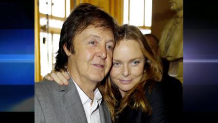 British musician Paul McCartney, left, poses with his daughter, designer Stella, at the Stella McCartneys spring-summer 2011 ready to wear fashion collection show, presented in Paris, Monday, Oct. 4, 2010. (AP Photo/Thibault Camus)