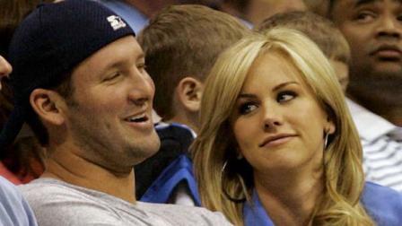 Dallas Cowboys quarterback Tony Romo, left, sits with Candice Crawford during the first half of an NBA basketball game of the Dallas Mavericks and the Oklahoma City Thunder in Dallas on Saturday, April 3, 2010.