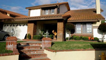 FILE - This March 9, 2009 file photo shows the house in which Nadya Suleman, mother of octuplets, has been living in for nearly two years in La Habra, Calif. The man who sold the home to Suleman says he is going ahead with eviction proceedings because she cant come up with a $450,000 balloon payment. (AP Photo/Nick Ut, File)