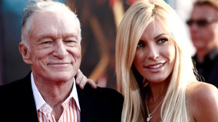 FILE - Hugh Hefner, left, and Crystal Harris arrives at the premiere of Iron Man 2 at the El Capitan Theatre in Los Angeles in this April 26, 2010 file photo. Hefner says hes gotten engaged again. Hefner said in a Twitter message early Saturday Dec. 24, 2010 that hed given a ring to girlfriend and Playmate Crystal Harris, saying she burst into tears. (AP Photo/Matt Sayles, File)