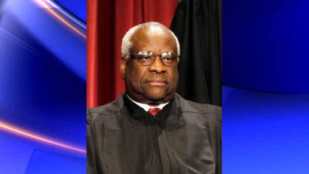 Associate Justice Clarence Thomas is seen during the group portrait at the Supreme Court Building in Washington, Friday, Oct. 8, 2010. (AP Photo/Pablo Martinez Monsivais)
