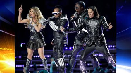 The Black Eyed Peas featuring Fergie, left, apl.de.ap., will.i.am, and Taboo, right, and apl.de.ap perform during halftime of NFL football Super Bowl XLV Sunday, Feb. 6, 2011, in Arlington, Texas. (AP Photo/Dave Martin)
