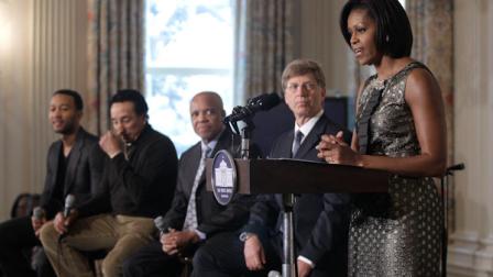 First lady Michelle Obama holds a music discussion for students, highlighting Motown artists, Thursday, Feb. 24, 2011, in the State Dining Room of the White House in Washington. From left are: singer John Legend; singer Smokey Robinson; Motown founder Berry Gordy Jr.; Grammy Museum Executive Director Bob Santelli, and Mrs. Obama. (AP Photo/Charles Dharapak)