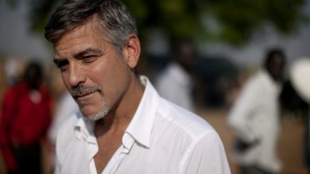 FILE - In this Jan. 9, 2011 photo, George Clooney stands outside a polling station on the first day of voting in the southern Sudanese capital city of Juba Clooney has recovered from the malaria he contracted earlier this month during a visit to Sudan. Publicist Stan Rosenfield says this was the actors second bout with the disease. Clooney is set to discuss the condition and his work in Africa on Piers Morgans CNN show Friday, Jan. 21. (AP Photo/Pete Muller)