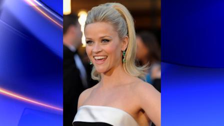 FILE - In this Feb. 27, 2011 file photo, Reese Witherspoon arrives before the 83rd Academy Awards in the Hollywood section of Los Angeles. A spokeswoman for Witherspoon says the star wed her fiance, Hollywood agent Jim Toth, Saturday, March 26, 2011 in Ojai, Calif., about 90 miles north of Los Angeles. (AP Photo/Chris Pizzello, File)