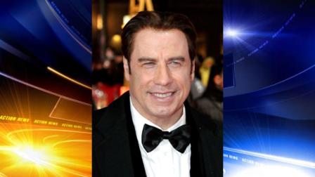 FILE - In this Feb. 5, 2011 file photo, U.S. actor John Travolta arrives for the 46th Golden Camera media award gala in Berlin, Germany. (AP Photo/Michael Sohn, file)