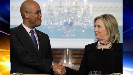Secretary of State Hillary Rodham Clinton stands with Haitis President-elect Michel Martelly during a press availability at the State Department in Washington, Wednesday, April 20, 2011. (AP Photo/Alex Brandon)