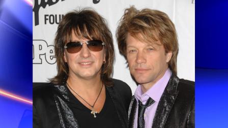 FILE - In this June 18, 2009 file photo, musicians Jon Bon Jovi, right, and musician Richie Sambora from the rock band Bon Jovi, attend the 40th annual Songwriters Hall of Fame ceremony in New York. (AP Photo/Peter Kramer, file)