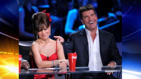 FILE - In this April 6, 2008 file photo, Paula Abdul, left, and Simon Cowell are seen on stage at the Idol Gives Back fundraising special of American Idol in Los Angeles. A person familiar with negotiations for The X Factor says Paula Abdul will be the fourth judge on the new Fox singing competition. Abdul will be on hand for the Sunday, May 8, 2011 taping of the first judging session in Los Angeles, according to a person familiar with the talks. The person spoke on the condition of anonymity because Fox and the shows producers had not authorized public comment. Widely expected, Abduls participation reunites her with fellow judge Simon Cowell, her former sparring partner on the American Idol judging panel. (AP Photo/Mark J. Terrill, File)