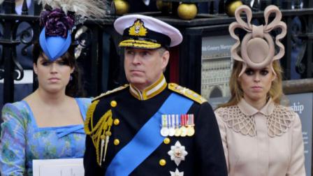 In this Friday, April, 29, 2011 file picture Britains Prince Andrew, center, and his daughters Britains Princess Eugenie, left, and Britains Princess Beatrice leave Westminster Abbey at the Royal Wedding in London . The eye-popping hat worn by Princess Beatrice at the royal wedding is to be auctioned to raise money for charity. Buckingham Palace said Thursday.The famous creation _ some said it looked like antlers on the princess head _ will be sold on eBay with the proceeds to go to the charities UNICEF and Children in Crisis.(AP Photo/Gero Breloer)