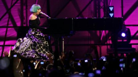 US singer Lady Gaga performs on stage during the Europride gay rights march, at Romes Circus Maximus, Saturday, June 11, 2011. (AP Photo/Riccardo De Luca)