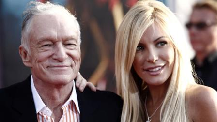 Hugh Hefner, left, and Crystal Harris arrives at the premiere of Iron Man 2 at the El Capitan Theatre in Los Angeles in this April 26, 2010 file photo.