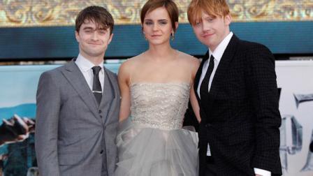 British actors, left to right, Daniel Radcliffe, Emma Watson and Rupert Grint, Trafalgar Square, in central London, for the World Premiere of Harry Potter and The Deathly Hallows: Part 2, the last film in the series, Thursday, July 7, 2011. (AP Photo/Joel Ryan)