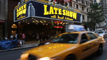 FILE - In this Oct. 4, 2009 file photo, traffic moves down Broadway, past the Ed Sullivan Theater where the Late Show with David Letterman is taped, in New York. Police responded to a 911 call of a burglary at the historic Ed Sullivan Theater on Broadway around 7 a.m., Sunday, July 10, 2011. The officers noticed some property damage and have taken one man into custody, but no arrests have yet been made. It was unclear how extensive the damage was. (AP Photo/Tina Fineberg, File)