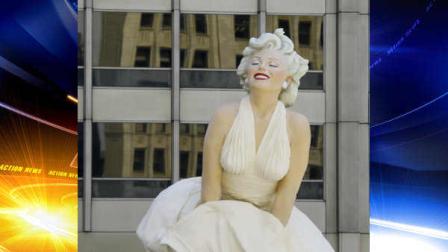 The face of Marilyn Monroe smiles on Seward Johnsons 26-foot-tall sculpture of Monroe, in her most famous wind-blown pose, on Michigan Ave. Friday, July 15, 2011 in Chicago. (AP Photo/Charles Rex Arbogast)