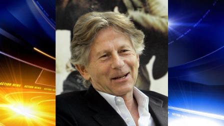 FILE - I this Nov. 29, 2005 file photo, Polish film director Roman Polanski waves during a photocall for his latest film Oliver Twist in Madrid, Spain. Polanskis Carnage will open the 49th annual New York Film Festival beginning Sept. 30, 2011. (AP Photo/Bernat Armangue, file)