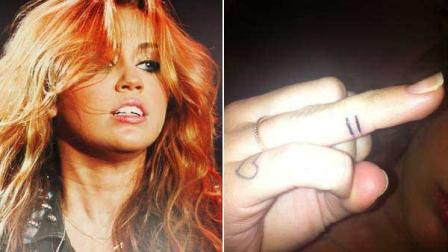 Singer Miley Cyrus in a photo from her official Twitter page taken on July 28. Right: The tatoo Cyrus posted on Twitter.