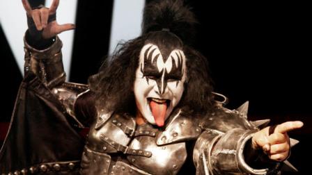 FILE - In this April 21, 2011 file photo, Gene Simmons, of the rock group KISS, introduces a signature Mini automobile at the New York International Auto Show. Organizers for the Michael Jackson tribute show announced Tuesday, Aug. 16, 2011, that they were dropping the band KISS from the lineup scheduled for October after fans, media and the late singers estate noted Gene Simmons had been critical of Jackson for years.