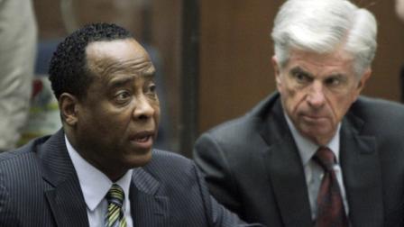Dr. Conrad Murray, singer Michael Jacksons personal physician, left, and his attorney J. Michael Flanagan appear in Los Angeles Superior Court Tuesday, Jan. 25, 2011. Murray pleaded not guilty to a charge of involuntary manslaughter in the pop stars death. (AP Photo/Irfan Khan, Pool)