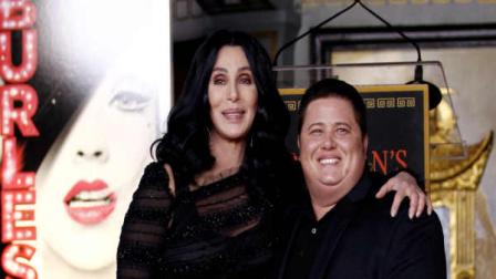 FILE - In this Nov. 18, 2010 file photo, Cher, left, and Chaz Bono pose together after a ceremony to put Chers hands and feet in cement in front of Graumans Chinese Theatre in Los Angeles. Cher has posted several tweets, Wednesday, Aug. 31, 2011, supporting Chaz Bonos decision to participate in the celebrity dance competition series, Dancing with the Stars. (AP Photo/Matt Sayles, file)