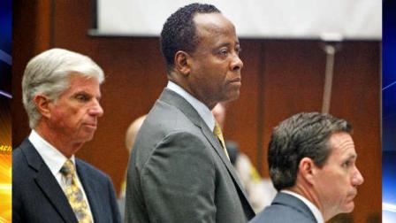 Conrad Murray, stands by his attorneys, J. Michael Flannigan, left and Edward Chernoff during court proceedings on the second day of Murrays involuntary manslaughter trial in the death of pop star Michael Jackson in downtown Los Angeles, Wednesday, Sept. 28, 2011. Murray has pleaded not guilty and faces four years in prison and the loss of his medical license if convicted of involuntary manslaughter.