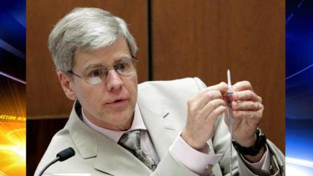 In this Oct. 21, 2011 file photo, Anesthesiology expert Dr. Steven Shafer holds an intravenous line as he is cross examined by Ed Chernoff, a defense attorney for Dr. Conrad Murray, background right, during Murrays involuntary manslaughter trial in Los Angeles. The final weeks of Dr. Conrad Murrays trial have hinged on the competing theories of Shafer and his colleague, Dr. Paul White. Murray has pleaded not guilty and faces four years in prison and the loss of his medical license if convicted of involuntary manslaughter in Michael Jacksons death.