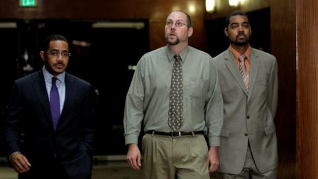 Christopher Chaney, 35, of Jacksonville, Fla., center, his attorneys Chris Chestnut, left, and Jamon Hicks arrive for a news conference in Los Angeles, Tuesday, Nov. 1, 2011. Chaney pleaded not guilty Tuesday to hacking into the email accounts of celebrities such as Christina Aguilera, Mila Kunis and Scarlett Johansson, whose nude photos eventually landed on the Internet. (AP Photo/Jae C. Hong)