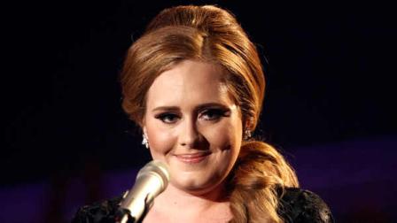 In this Aug. 28, 2011 file photo, singer Adele is shown at the MTV Video Music Awards in Los Angeles. Adeles miserable love life has brought her heavenly success this year: The mournful album 21 is years best-selling album with over 4 million copies sold and has resulted in two smash singles,Rolling in the Deep and Someone Like You. The Recording Academy will likely add to Adeles good year on Wednesday when it announces its Grammy nominations on Wednesday evening.