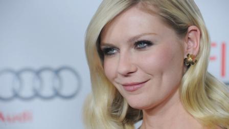 Kirsten Dunst arrives at the AFI special screening of Melancholia at Graumans Chinese Theater, Sunday, Nov. 6, 2011, in Los Angeles. Melancholia opens in theaters Nov. 11, 2011. (AP Photo/Katy Winn)
