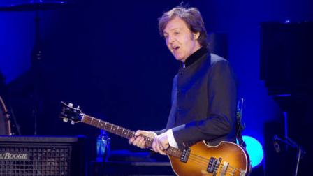 Sir Paul McCartney performs on stage during his Good Evening Europe European Tour, his first since 2004, at the O2 arena in London, Monday, Dec. 5, 2011. The london gig is the culmination of seven special arena shows across Europe.