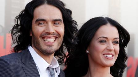 FILE- In this Tuesday, April 19, 2011 file photo, British actor Russell Brand and his wife Katy Perry arrive for the European premiere of Arthur, in London. (AP Photo/Joel Ryan, FILE