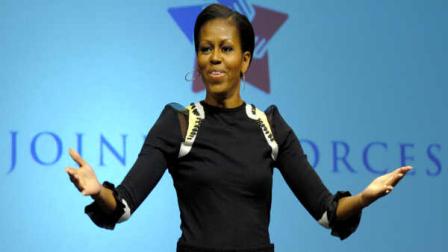 First lady Michelle Obama joins the cast of Nickelodeons iCarly in performing the random dance at a special screening of iMeet The First Lady episode of the show, at Hayfield Secondary School in Fairfax, Va., Friday, Jan. 13, 2012. (AP Photo/Cliff Owen)