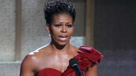 First lady Michelle Obama introduces BET honoree Maya Angelou during the BET Honors at the Warner Theatre in Washington on Saturday, Jan. 14, 2012. (AP Photo/Jose Luis Magana)