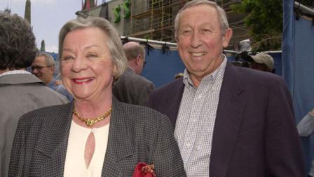 Roy E. Disney, vice chairman of the board of Walt Disney Co., right, and his wife, Patty, arrive for the premiere for the Disney animated film, Atlantis: The Lost Empire, Sunday, June 3, 2001, in the Hollywood section of Los Angeles. (AP Photo/Kim D. Johnson)