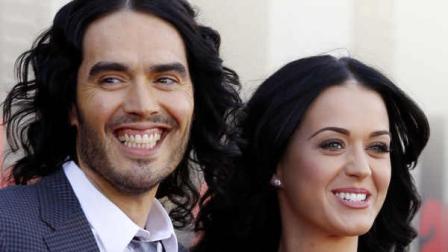 FILE- In this Tuesday, April 19, 2011 file photo, British actor Russell Brand and his wife Katy Perry arrive for the European premiere of Arthur, in London. (AP Photo/Joel Ryan, FILE