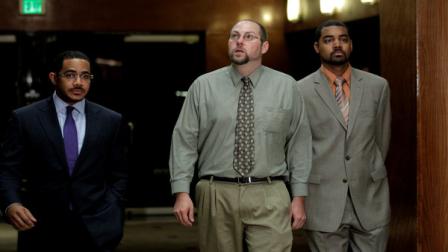 Christopher Chaney, 35, of Jacksonville, Fla., center, his attorneys Chris Chestnut, left, and Jamon Hicks arrive for a news conference in Los Angeles, Tuesday, Nov. 1, 2011. Chaney pleaded not guilty Tuesday to hacking into the email accounts of celebrities such as Christina Aguilera, Mila Kunis and Scarlett Johansson, whose nude photos eventually landed on the Internet.