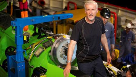 This February 2012 photo, provided by National Geographic, shows explorer and filmmaker James Cameron emerging from the hatch of DEEPSEA CHALLENGER during testing of the submersible in Jervis Bay, south of Sydney, Australia. Earths lost frontier, the deepest part of the oceans where the pressure is like three SUVs sitting on your little tow, is about to be explored first-hand. Its been more than half a century since man dared to plunge that deep. Earths lost frontier is about to be explored firsthand after more than half a century. Its a mission to the deepest part of the ocean, so deep that the pressure is the equivalent of three SUVs sitting on your toe. And its being launched by the rich and famous. (AP Photo/Mark Thiessen, National Geographic)