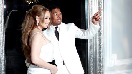 U.S singer Mariah Carey, left, and her husband Nick Cannon pose in Paris, for the renewal of their wedding vows, Friday, April 27, 2012. (AP Photo/Thibault Camus)