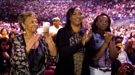 Whitney Houstons mom Cissy Houston, left, sister-in-law Pat Houston and niece Rayah Houston watch a memorial tribute to Whitney Houston at Gospelfest in Newark, NJ, Saturday, May 12, 2012. (AP Photo/Charles Sykes)