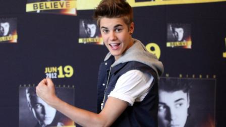 Pop star Justin Bieber poses for photos prior to a press conference at a hotel in Mexico City, Monday, June 11, 2012. Bieber will perform in a free open-air concert tonight at the Mexico Citys main historic plaza, the Zocalo. (AP Photo/Alexandre Meneghini)