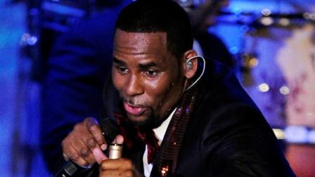 In this Feb. 12, 2011 photo, R. Kelly performs at the pre-Grammy gala and salute in Beverly Hills, Calif. The outrageous musical series started off as five videos for the R&B singers dramatic cliffhanger songs in 2007. It quickly became a cult classic and he added more chapters and put the accompanying videos on a DVD also teamed up with IFC to premiere it. (AP Photo/Mark J. Terrill)