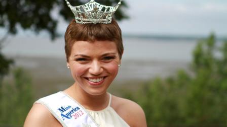 Newly crowned Miss Alaska Debbe Ebben poses for a photo on Wednesday, June 20, 2012, at Elderberry Park in downtown Anchorage, Alaska. (AP Photo/Dan Joling)