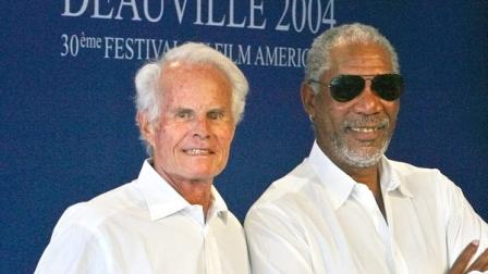 Producer Richard D. Zanuck, left, and actor Morgan Freeman pose during a photocall at the 30th American Film Festival of Deauville, Normandy, Tuesday, Sept. 7, 2004. The festival will pay a tribute to Zanuck Tuesday evening. (AP Photo/Franck Prevel)