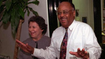 Washington Post columnist William Raspberry celebrates in Washington Tuesday, April 12, 1994, after it was announced that he had won the 1994 Pulitzer Prize for commentary. (AP PHOTO/Denis Paquin)