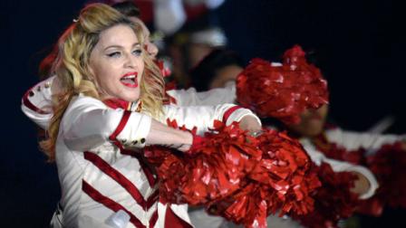 In this picture taken Aug. 18. 2012, US singer Madonna performs one stage during a concert in Zurich, Switzerland. (AP Photo/Keystone/Walter Bieri)