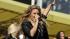 Miley Cyrus and her sister Brandi Cyrus attend...